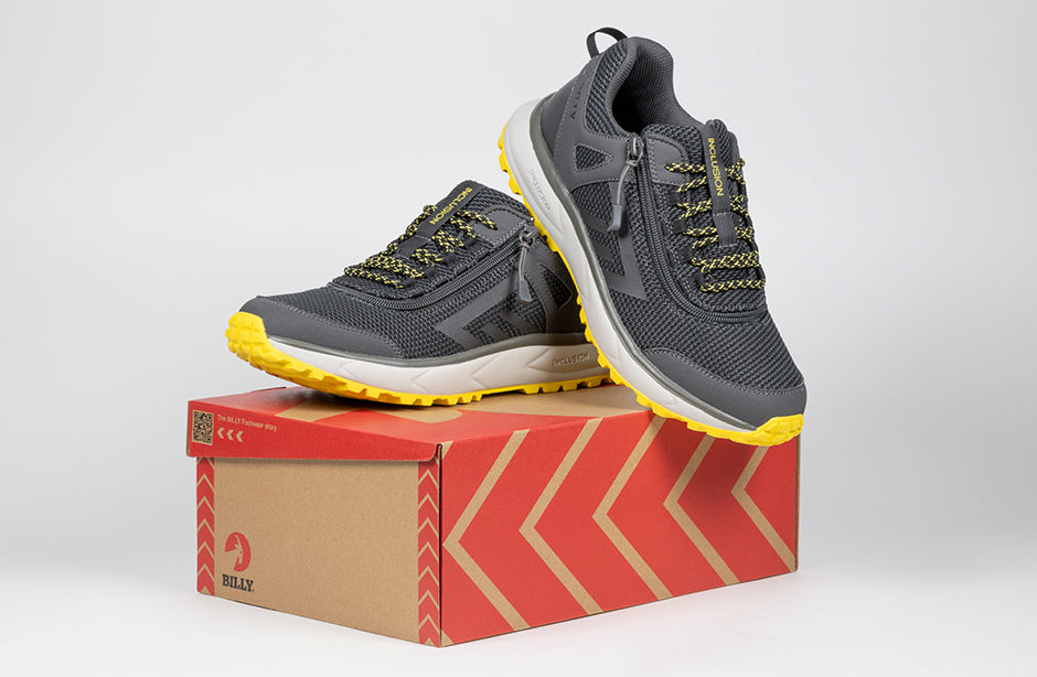 Men's Charcoal/Yellow BILLY Inclusion Trail Sneakers for diabetes, plantar fasciitis, bunions, and orthotics on display box.