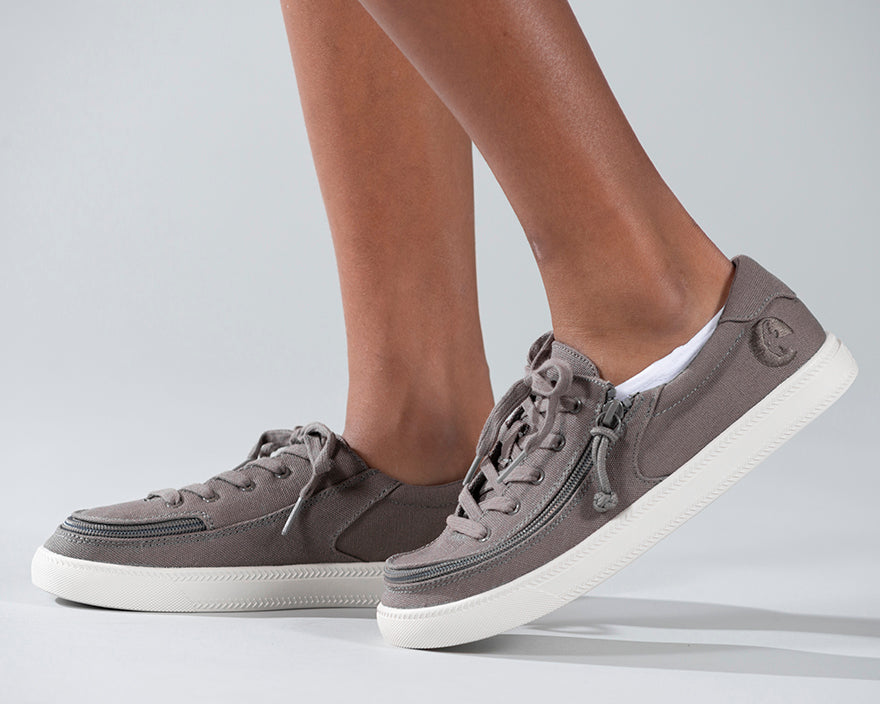 Kid's Dark Grey BILLY Classic Lace Lows, zipper shoes, like velcro, that are adaptive, accessible, inclusive and use universal design to accommodate an afo. Footwear is medium and wide width, M, D and EEE, are comfortable, and come in toddler, kids, mens, and womens sizing.