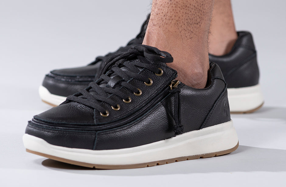 Men's black leather comfort shoes with wraparound zipper, ideal for diabetics, bunions, and orthotics. Suited for wide feet.