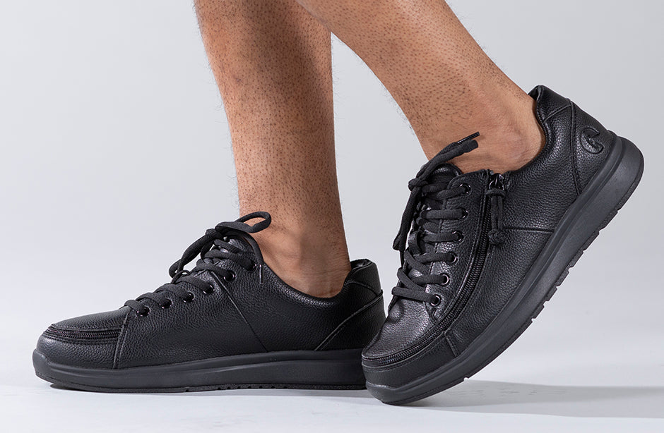 Men's black slip-resistant work shoes with faux leather, wraparound zipper, ideal for diabetes, plantar fasciitis, bunions, and orthotics.
