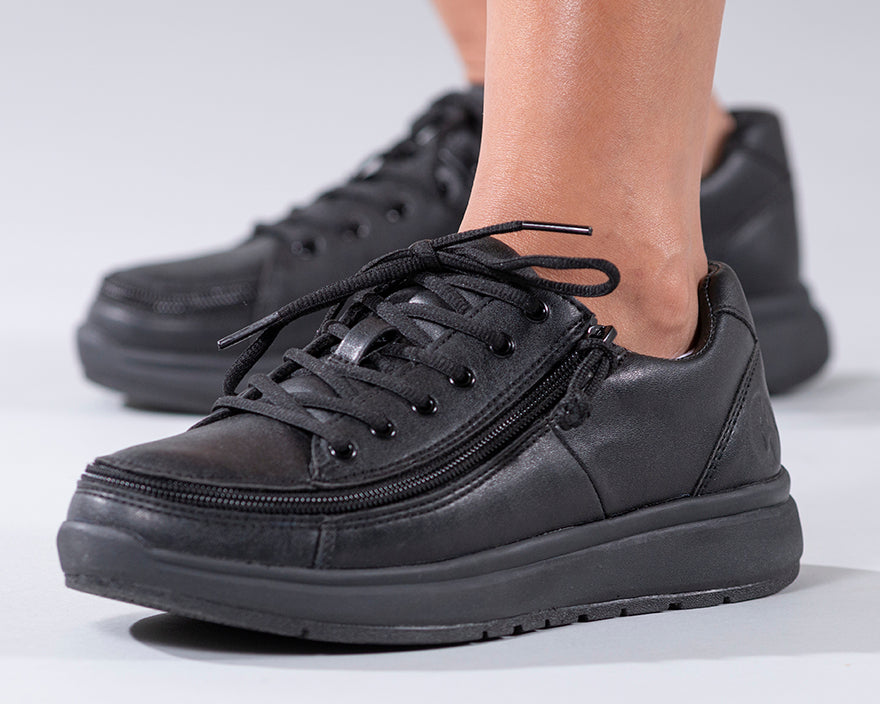 Women's Black to the Floor BILLY Work Comfort Lows, zipper shoes, like velcro, that are adaptive, accessible, inclusive and use universal design to accommodate an afo. Footwear is medium and wide width, M, D and EEE, are comfortable, and come in toddler, kids, mens, and womens sizing.